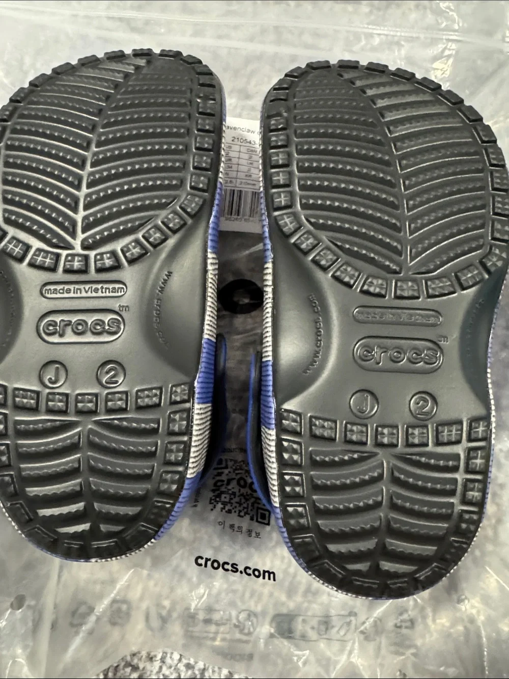 CROCS Black Kids Clogs with Blue Raven & Crest Charms